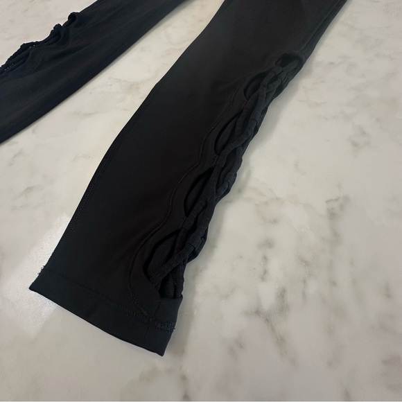 Lululemon Black “Tied to it” High Rise Leggings with mesh/tied ankle detail. - Picture 5 of 13